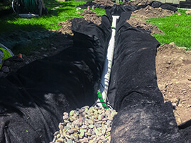 French Drain With Rock Bed